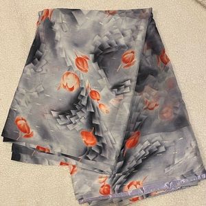 Gray saree with orange flowers